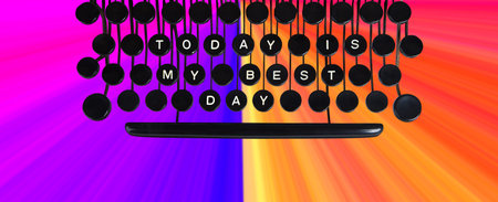 Today is my best day spelled on a vintage keyboard on rainbow background