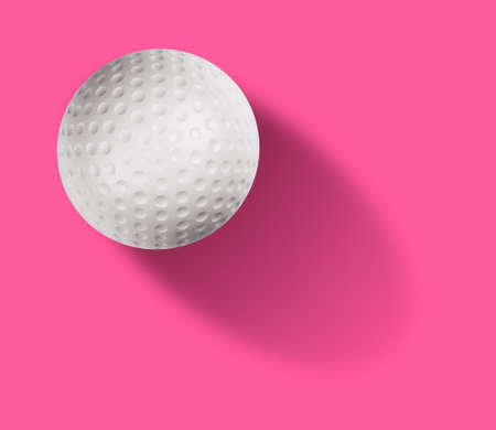 Golf ball on pink background.の写真素材