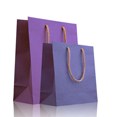 Violet and blue shopping bags on white with space for your text or logoの写真素材