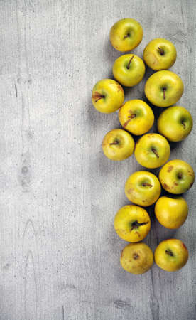 Several apples on wood tableの写真素材