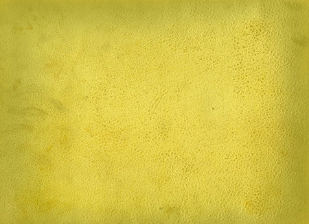 Yellow background ( old leather)の写真素材