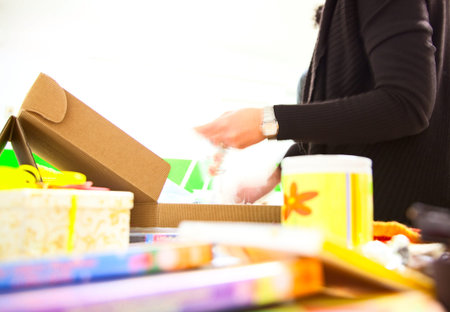 Abstract  store for background (Female hands with boxes)の写真素材