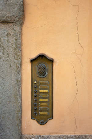 Old entrance door intercom background.の写真素材