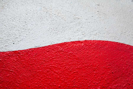 Red and white backdrop. Rusty painted surfaceの写真素材