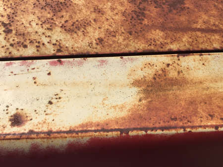 rusty metal background, metal panels with surface corrosion and old paintの写真素材