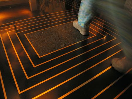 Feet entering a business building lobbyの写真素材