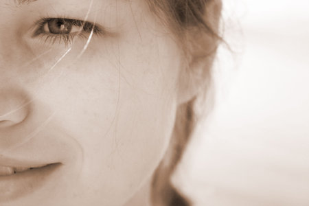 Young woman with a gentle smile on her faceの写真素材