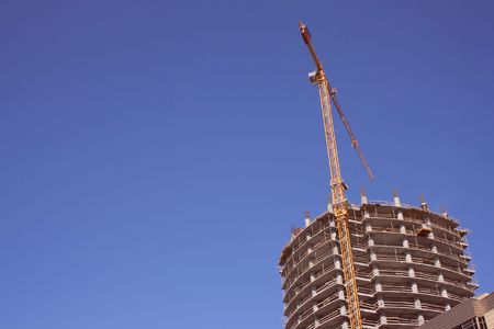 Construction of modern building. Blue skyの写真素材