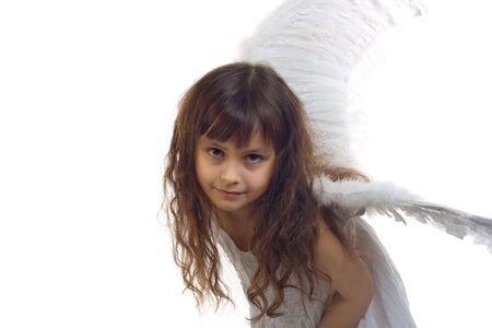 Portrait of beautiful girl with angel's wings on white backgroundの写真素材
