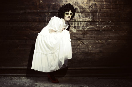 Fashion art photo. The beautiful young girl. Retro styled photoの写真素材