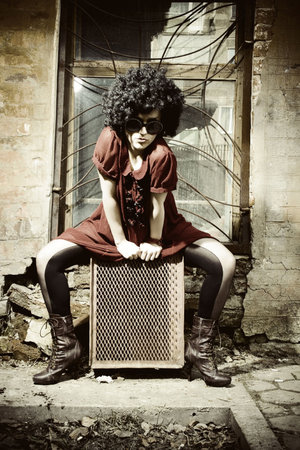 Fashion art photo. The beautiful young girl. Retro styled photoの写真素材