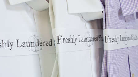 Laundered dress shirts white, purple, cotton, perfect collars ready for the busy dayの写真素材