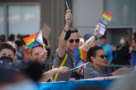 San Francisco, CA, USA - June 22, 2022: Pride Parade: Photo shows attendee with mesh top walking along the parade routeのeditorial素材