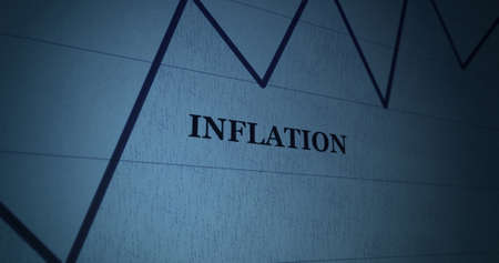 Inflation concept against a blue dark depressing backgroundの写真素材