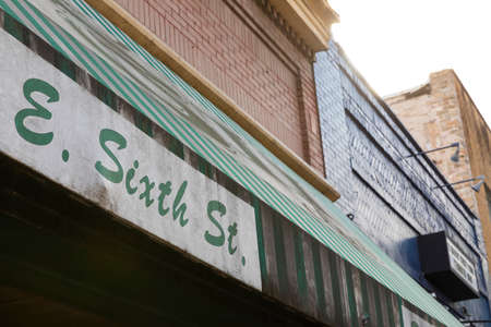 Photo of E Sixth Street sign in downtown Austin, Texasのeditorial素材