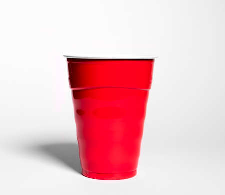 Plastic red cup on a white backgroundの写真素材