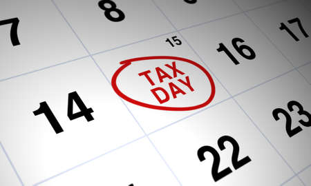 Tax day circled in red on white calendarの写真素材