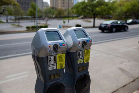 Austin, Texas U.S.A. - April 4, 2021: Parking meters in the streetのeditorial素材