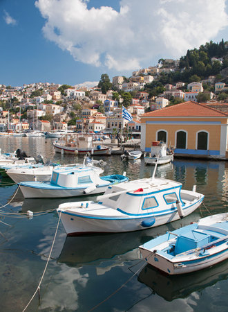 Gialos ( the lower harbour town ) and Chorio ( the upper town ) together form Symi town on the Greek island of Symi, near Rhodes in the Mediterranean sea. A quite beautiful, very tranquil, and highly colourful placeの写真素材