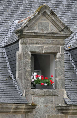 Floral display in the village of Locronan, in Brittany, rural Franceの写真素材