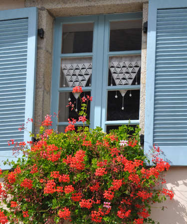 Floral display in the village of Locronan, in Brittany, rural Franceの写真素材