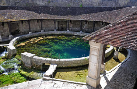 Tonnerre in the Morvan, Burgundy, France sits on the River Armancon. Famed for theTonnerre Fosse Dionne wash houseの写真素材