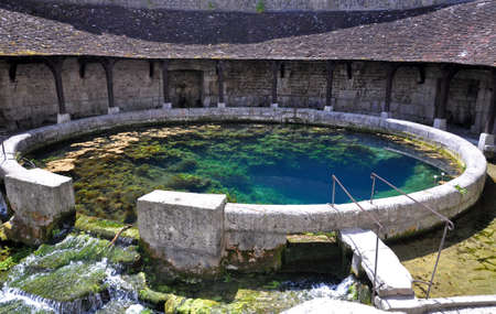 Tonnerre in the Morvan, Burgundy, France sits on the River Armancon. Famed for theTonnerre Fosse Dionne wash houseの写真素材