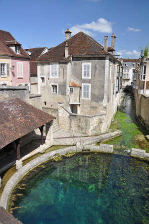 Tonnerre in the Morvan, Burgundy, France sits on the River Armancon. Famed for theTonnerre Fosse Dionne wash houseの写真素材