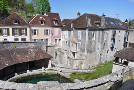 Tonnerre in the Morvan, Burgundy, France sits on the River Armancon. Famed for theTonnerre Fosse Dionne wash houseの写真素材
