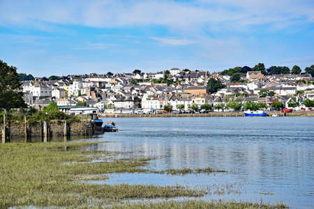 Bideford, North Devon, England 13th July 2017 - The quay and old bridge in the port of Bideford in North Devon, England, taken from the Tarka Trail looking west across the river Torridgeのeditorial素材