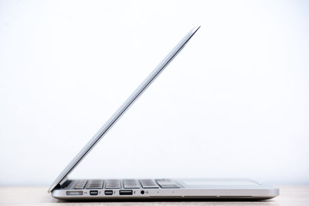 laptop on the table and white background