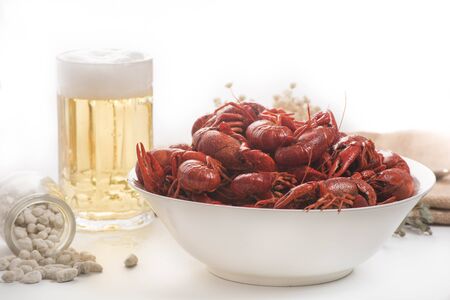 plate of boiled crawfish on wooden surfaceの写真素材