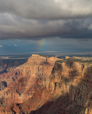 Awesome rainbow above South Rim of Grand Canyon, Arizona, United Statesの写真素材