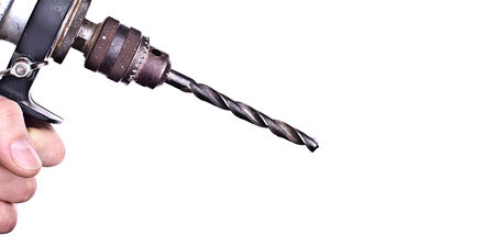 Powerful Drill In A Man's Hand - Much Space For Own Text On This Isolateの写真素材