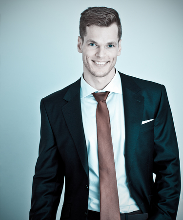 Cheerful young businessman portraitの写真素材