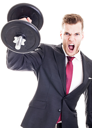 Success Concept - Businessman lifting dumbbell and screaming, isolated on whiteの写真素材