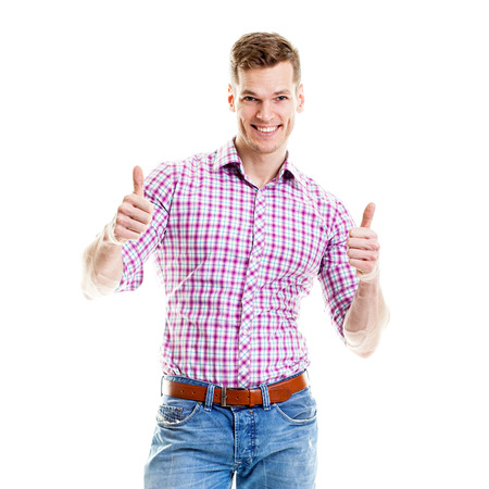 Stylish young man showing both thumbs upの写真素材