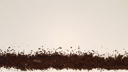 Ground Coffee Laid Out on White Backgroundの写真素材