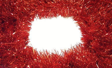 Christmas Tinsel Garland on White Background.  Happy Holidays and Season's Greetings Border Frame.の写真素材