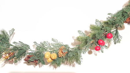 Green Merry Christmas Garland With Nature Ornaments.  Happy Holidays and Season's Greetings Greenery Decoration.の写真素材