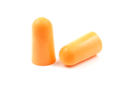 Foam ear plugs on a white backgroundの写真素材