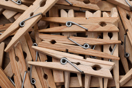 Pile of wooden clothes pegs or pins