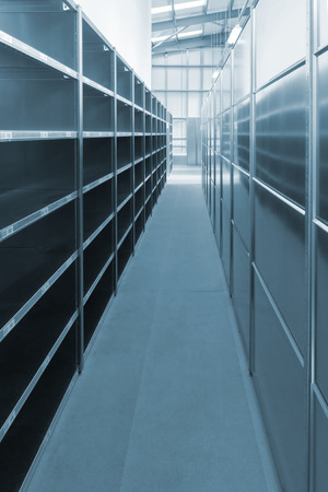 Empty warehouse storage shelves and racksの写真素材