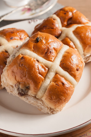 Hot Cross Buns traditionally eaten hot or toasted during Lentの写真素材