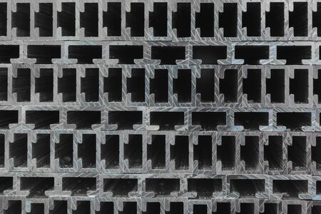 Cross sections of extruded aluminium or aluminum channels for use in manufacturing and fabricationの写真素材