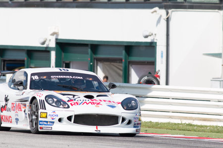 MISANO ADRIATICO, Rimini, ITALY - May 10:  A Ginetta G50 CUP of Nova Race team, driven By ANTILLA Jesse (FIN) and  BUGLIOTTI Fran Viel (ARG), the GT4 European Series car racing on May 10, 2014 in Misano Adriatico, Rimini, Italy.のeditorial素材