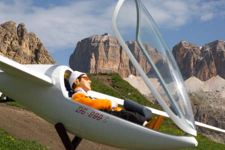 VAL DI FASSA â COL DEL CUC, ITALY - JULY 28: Radio controlled model airplane in flight in a Euromeeting Fly, July 28, 2013 in Val Di Fassa, Pordoi, Col del Cuc, Italyのeditorial素材