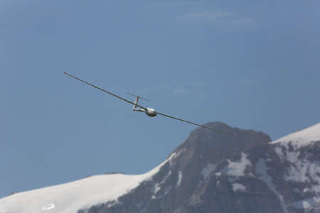 VAL DI FASSA â COL DEL CUC, ITALY - JULY 28: Radio controlled model airplane in flight in a Euromeeting Fly, July 28, 2013 in Val Di Fassa, Pordoi, Col del Cuc, Italyのeditorial素材