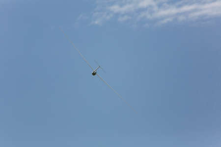 VAL DI FASSA â COL DEL CUC, ITALY - JULY 28: Radio controlled model airplane in flight in a Euromeeting Fly, July 28, 2013 in Val Di Fassa, Pordoi, Col del Cuc, Italyのeditorial素材