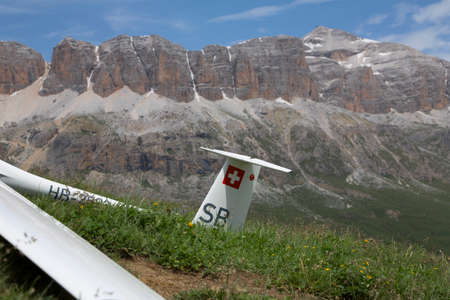 VAL DI FASSA â COL DEL CUC, ITALY - JULY 28: Radio controlled model airplane in a Euromeeting Fly, July 28, 2013 in Val Di Fassa, Pordoi, Col del Cuc, Italyのeditorial素材